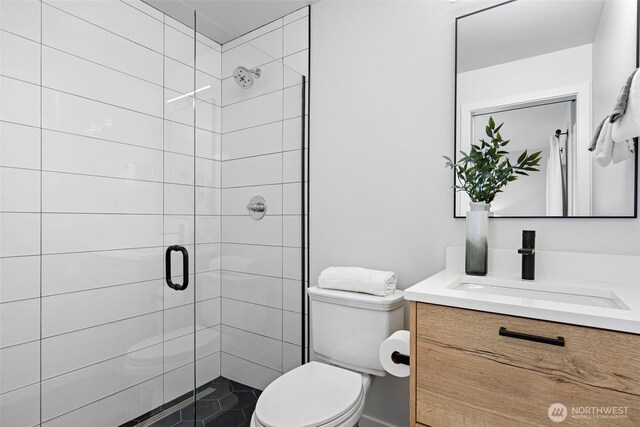 2014 E Pine St Unit A, Seattle, WA 98122 - bathroom with vanity, toilet, and a shower stall
