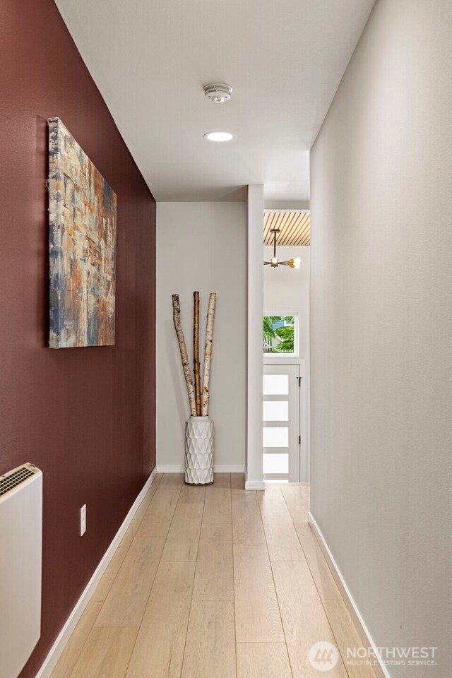 2014 E Pine St Unit A, Seattle, WA 98122 - corridor with hardwood / wood-style floors, baseboards, and heating unit