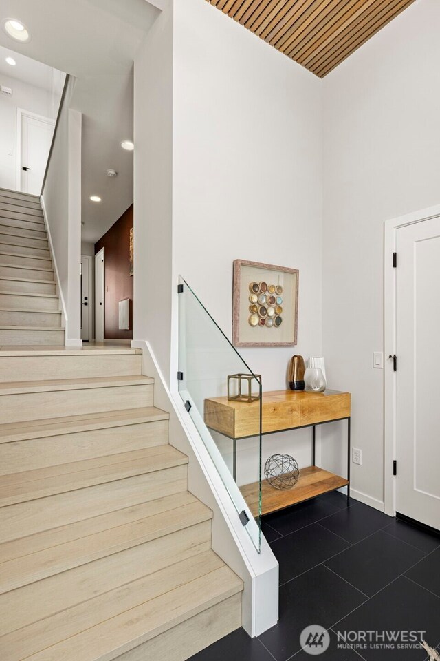 2014 E Pine St Unit A, Seattle, WA 98122 - staircase featuring tile patterned floors, recessed lighting, and baseboards
