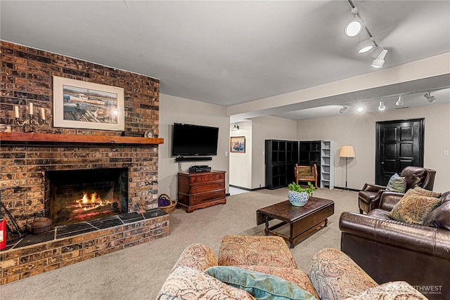 1108 Dale St SE, East Wenatchee, WA 98802 - carpeted living room with track lighting and a fireplace