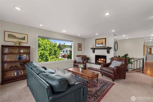 1108 Dale St SE, East Wenatchee, WA 98802 - living area featuring a brick fireplace, light carpet, and recessed lighting
