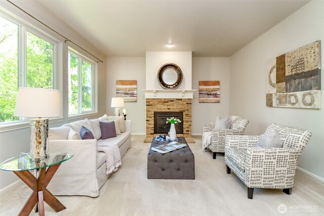 1913 NE 32nd St, Renton, WA 98056 - carpeted living room featuring baseboards and a fireplace
