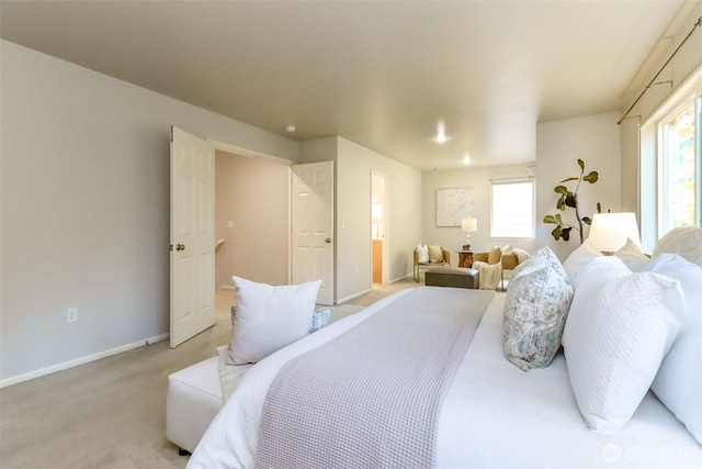 1913 NE 32nd St, Renton, WA 98056 - bedroom featuring light colored carpet and baseboards