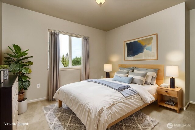1913 NE 32nd St, Renton, WA 98056 - bedroom featuring light carpet and baseboards