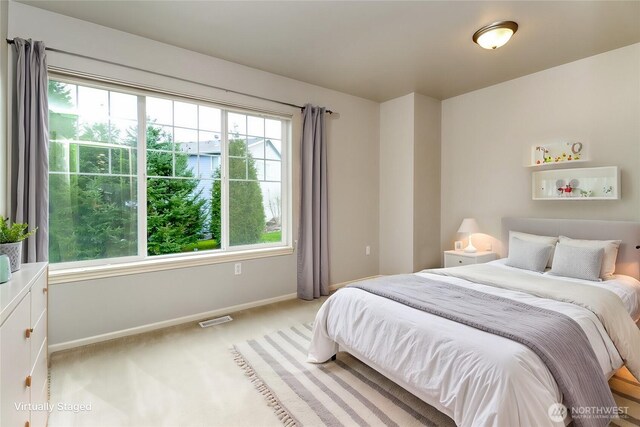 1913 NE 32nd St, Renton, WA 98056 - bedroom with light colored carpet and baseboards