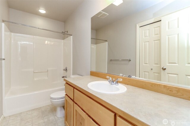 1913 NE 32nd St, Renton, WA 98056 - bathroom featuring toilet, vanity, and shower / bathtub combination