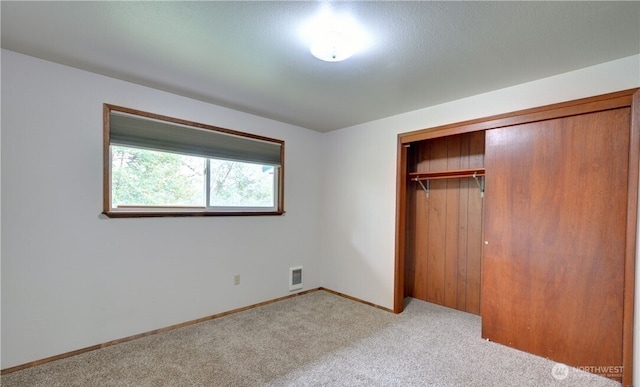 16327 Smokey Point Blvd Unit 1 & 2, Marysville, WA 98271 - unfurnished bedroom with light carpet, a closet, baseboards, and heating unit
