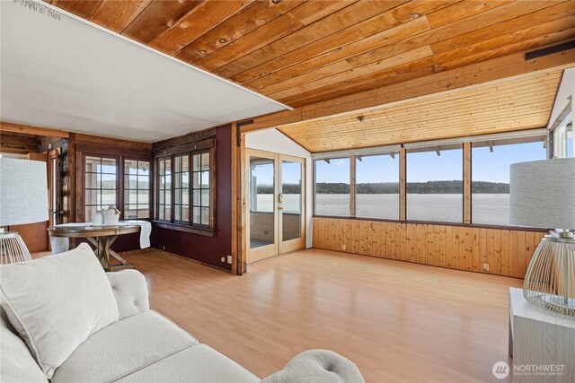 24186 Vashon Hwy SW, Vashon, WA 98070 - sunroom featuring plenty of natural light, a water view, and french doors
