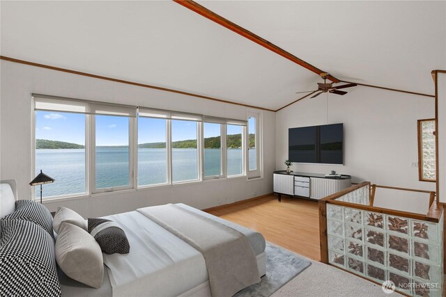 24186 Vashon Hwy SW, Vashon, WA 98070 - bedroom with multiple windows, vaulted ceiling, and wood finished floors