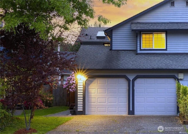 2113 186th Pl SE, Bothell, WA 98012 - view of front of house featuring roof with shingles, a garage, and asphalt driveway
