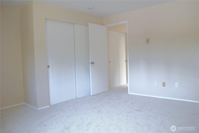 2113 186th Pl SE, Bothell, WA 98012 - unfurnished bedroom with carpet flooring, a closet, and baseboards