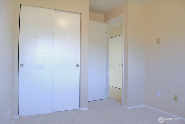 2113 186th Pl SE, Bothell, WA 98012 - unfurnished bedroom with carpet flooring, a closet, and baseboards