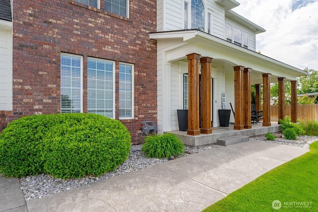331 Viewmont Dr SE, Moses Lake, WA 98837 - property entrance with a porch and brick siding