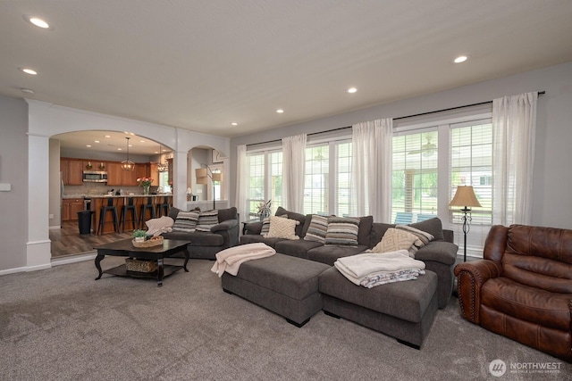 331 Viewmont Dr SE, Moses Lake, WA 98837 - carpeted living room with arched walkways, recessed lighting, and baseboards