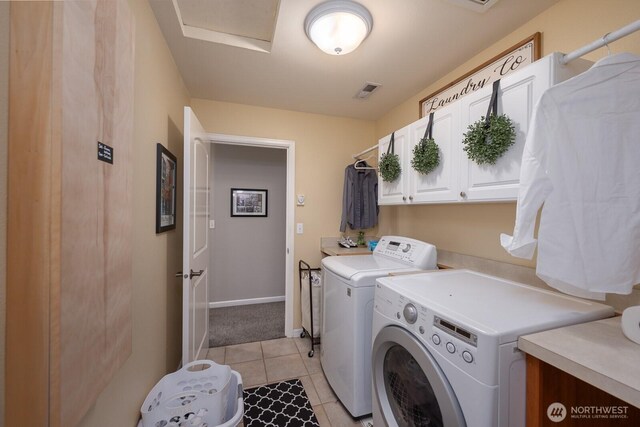 331 Viewmont Dr SE, Moses Lake, WA 98837 - washroom with cabinet space, washer and dryer, light tile patterned floors, and baseboards