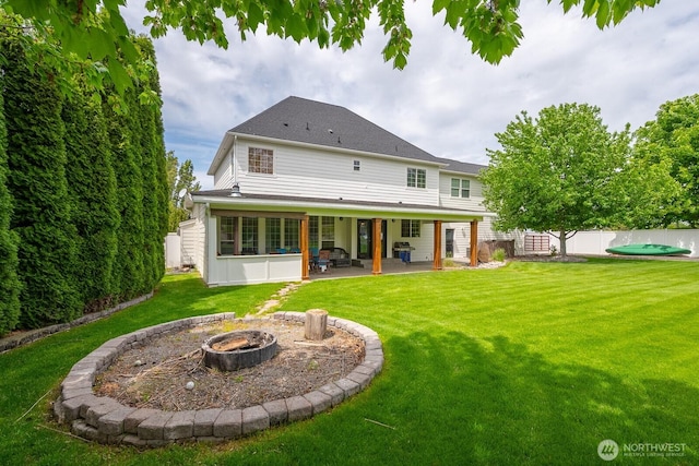 331 Viewmont Dr SE, Moses Lake, WA 98837 - back of house with an outdoor fire pit and a patio