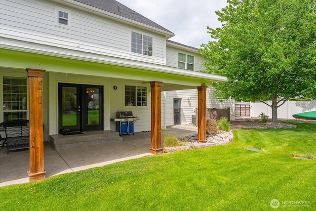 331 Viewmont Dr SE, Moses Lake, WA 98837 - rear view of house with french doors and a patio area