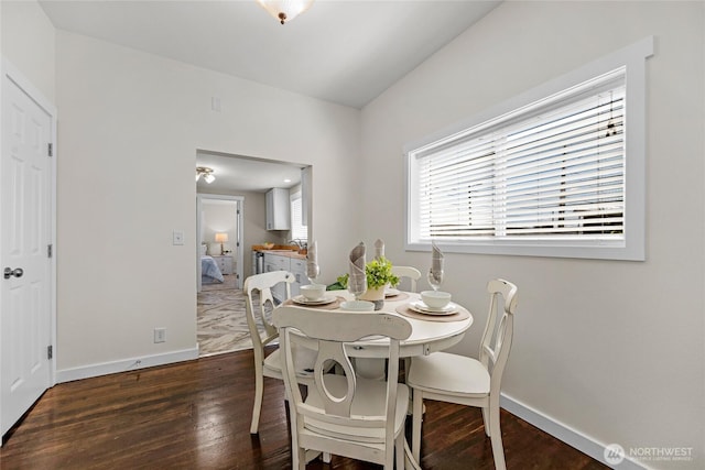 2409 Lombard Ave Unit C, Everett, WA 98201 - dining area featuring dark wood-style floors and baseboards