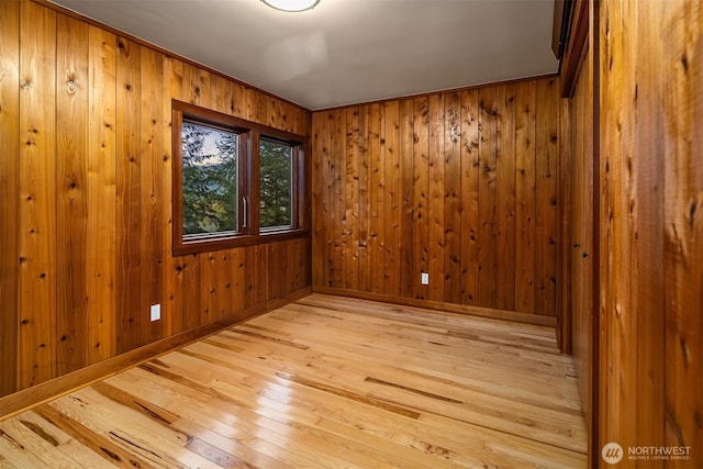 15027 146th Ave NE, Arlington, WA 98223 - unfurnished room with light wood finished floors and wooden walls