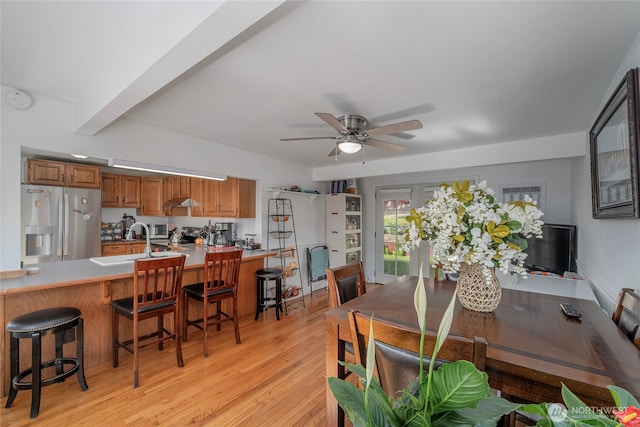 1011 N Dolfay Ln, East Wenatchee, WA 98802 - dining area featuring ceiling fan and light wood-style flooring