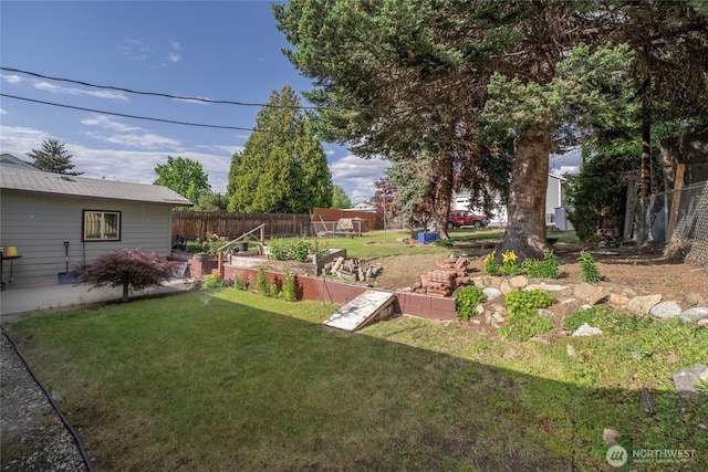 1011 N Dolfay Ln, East Wenatchee, WA 98802 - view of yard featuring a vegetable garden