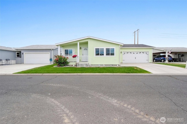 1701 E Burr Ave Unit 36, Moses Lake, WA 98837 - ranch-style house with concrete driveway, a garage, and a front yard
