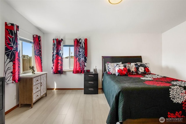 1701 E Burr Ave Unit 36, Moses Lake, WA 98837 - bedroom with light wood-type flooring and baseboards