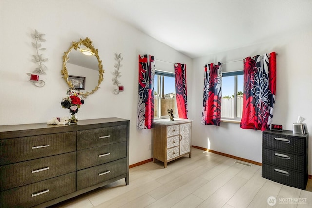 1701 E Burr Ave Unit 36, Moses Lake, WA 98837 - bedroom with baseboards and light wood-style floors