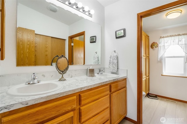 1701 E Burr Ave Unit 36, Moses Lake, WA 98837 - full bath featuring double vanity and wood finished floors