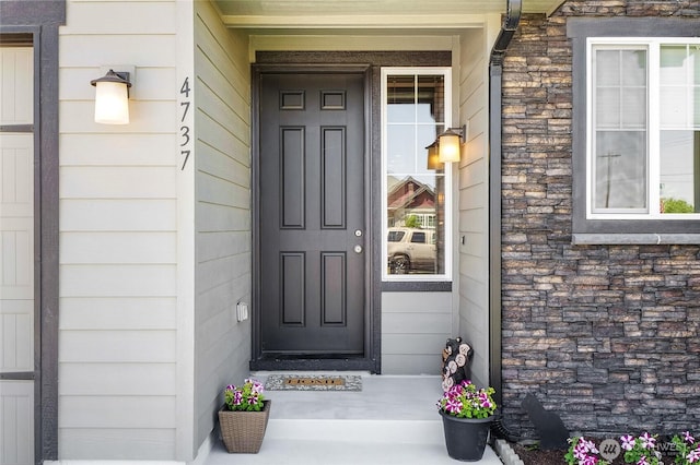4737 W Owl St, Moses Lake, WA 98837 - property entrance featuring stone siding
