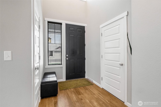 4737 W Owl St, Moses Lake, WA 98837 - foyer entrance featuring light wood-style flooring and baseboards