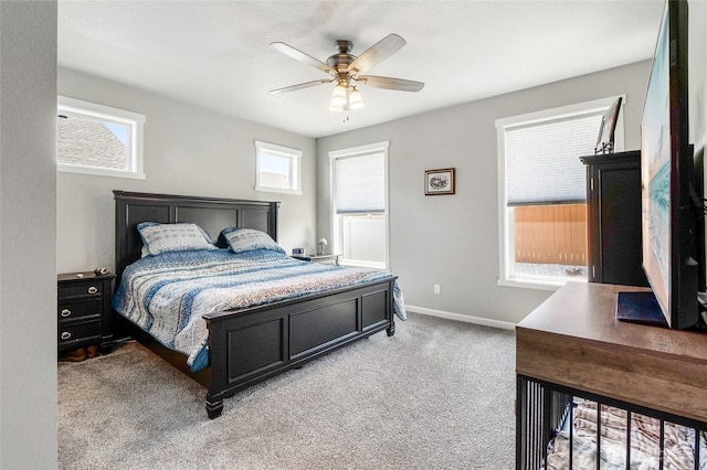 4737 W Owl St, Moses Lake, WA 98837 - bedroom featuring multiple windows, light colored carpet, baseboards, and a ceiling fan