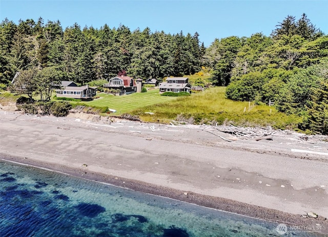 62 Wildwood Ln, Lopez Island, WA 98261 - view of subject property with a forest and a nearby body of water