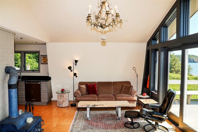 62 Wildwood Ln, Lopez Island, WA 98261 - living area with light wood finished floors and a chandelier
