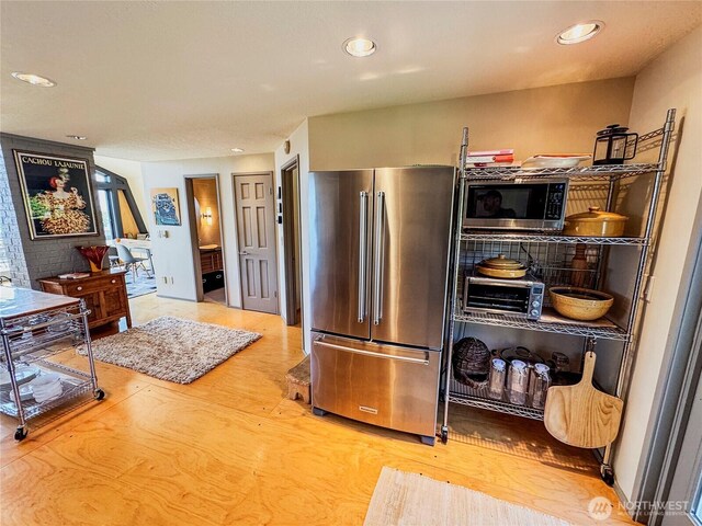 62 Wildwood Ln, Lopez Island, WA 98261 - kitchen with stainless steel appliances, recessed lighting, and wood finished floors