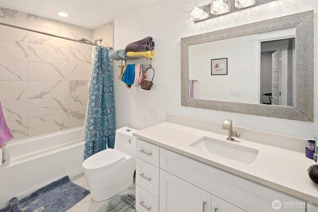 16422 76th Ave NE, Kenmore, WA 98028 - bathroom featuring vanity, shower / bath combo, toilet, marble look tiles, and recessed lighting