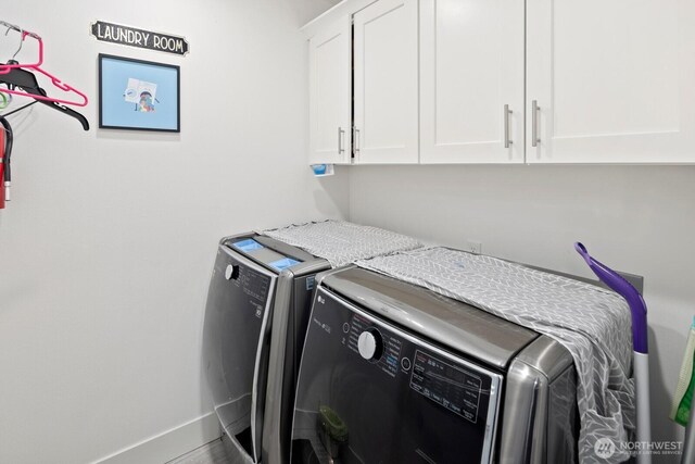 16422 76th Ave NE, Kenmore, WA 98028 - laundry area featuring cabinet space, independent washer and dryer, and baseboards