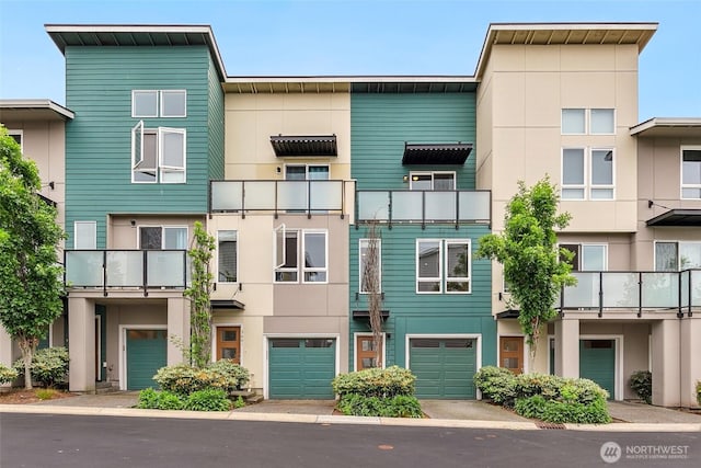3581 NE 146th Pl, Shoreline, WA 98155 - view of apartment building / complex with a garage and driveway