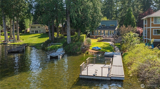 2942 222nd Pl SE, Sammamish, WA 98075 - dock area with a yard, a deck with water view, and a boat ramp