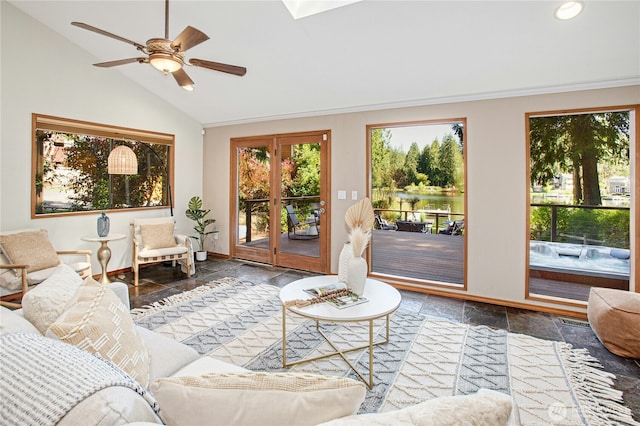 2942 222nd Pl SE, Sammamish, WA 98075 - living room featuring baseboards, stone tile flooring, ceiling fan, french doors, and vaulted ceiling