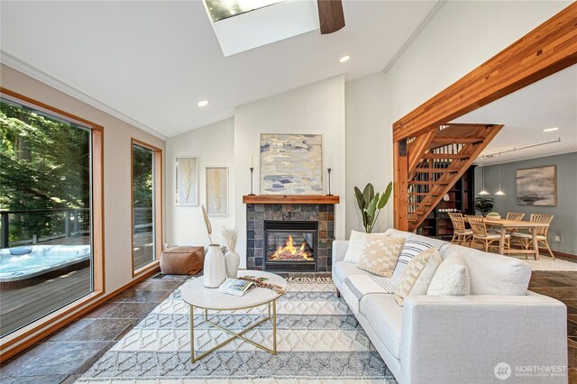 2942 222nd Pl SE, Sammamish, WA 98075 - living area featuring stairs, recessed lighting, a tile fireplace, baseboards, and lofted ceiling