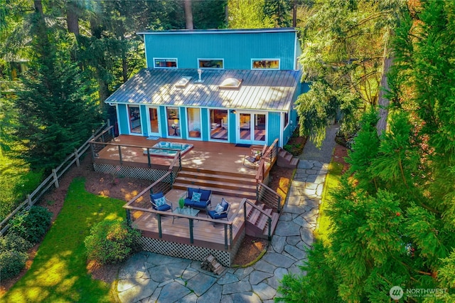 2942 222nd Pl SE, Sammamish, WA 98075 - back of house featuring a wooden deck and metal roof
