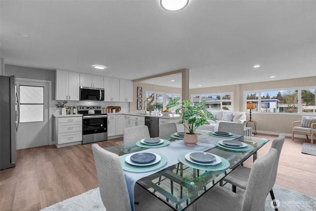 18501 52nd Ave W Unit 83, Lynnwood, WA 98037 - dining room with light wood-style floors and recessed lighting