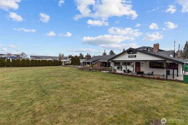 18501 52nd Ave W Unit 83, Lynnwood, WA 98037 - view of grassy yard with a patio