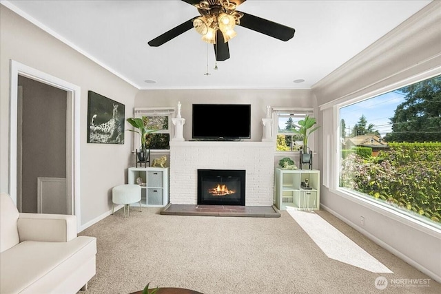 6712 A St, Tacoma, WA 98408 - carpeted living area featuring a fireplace, baseboards, ceiling fan, and ornamental molding
