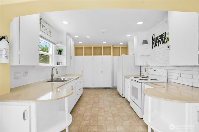 6712 A St, Tacoma, WA 98408 - kitchen featuring white range with electric cooktop, open shelves, a sink, backsplash, and recessed lighting