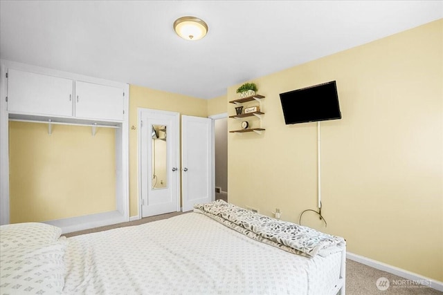 6712 A St, Tacoma, WA 98408 - bedroom featuring baseboards, carpet flooring, and a closet