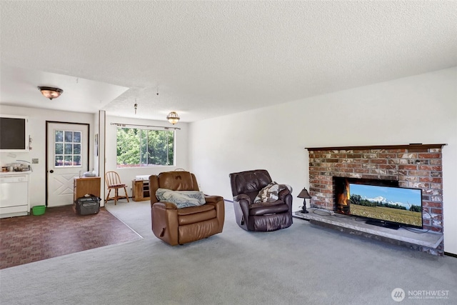 3125 Mcleod Rd, Bellingham, WA 98225 - carpeted living room with a brick fireplace and a textured ceiling