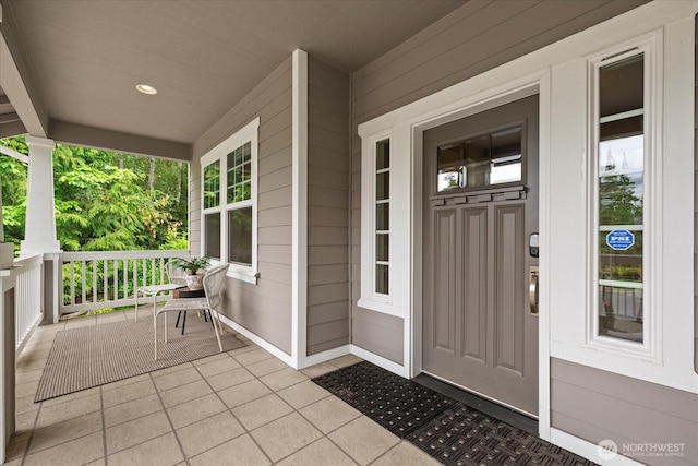 7320 111th Pl SE, Newcastle, WA 98056 - view of exterior entry with a porch