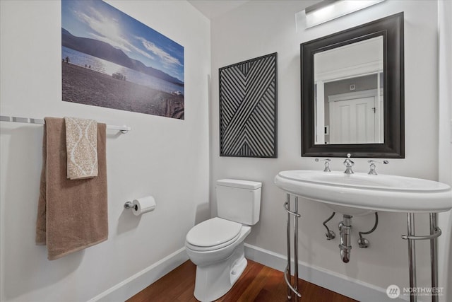 7320 111th Pl SE, Newcastle, WA 98056 - half bath featuring toilet and wood finished floors